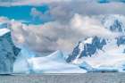 Antarctica, Yalour Islands. Tourists in Zodiacs viewing icebergs. Art Print